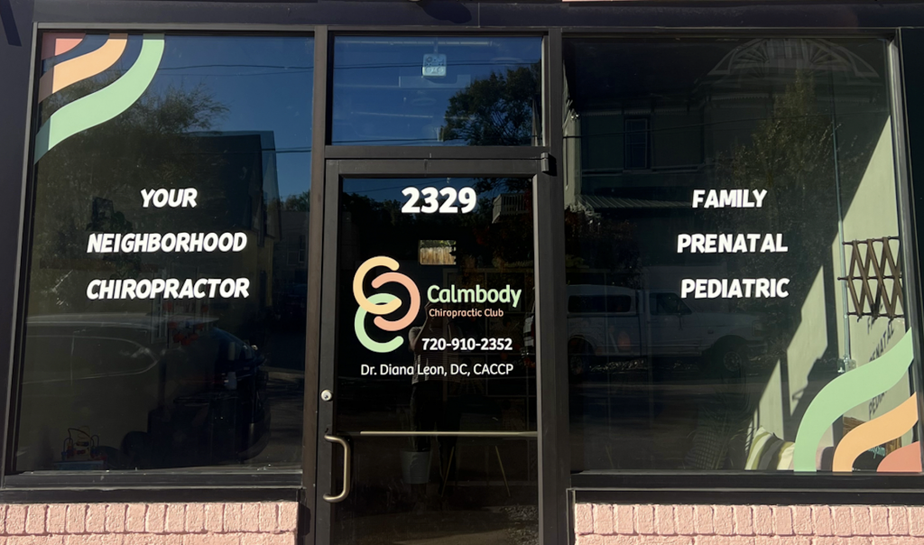 Front entrance of Calmbody Chiropractic Club in Denver, CO displaying services for family, prenatal, and pediatric chiropractic care